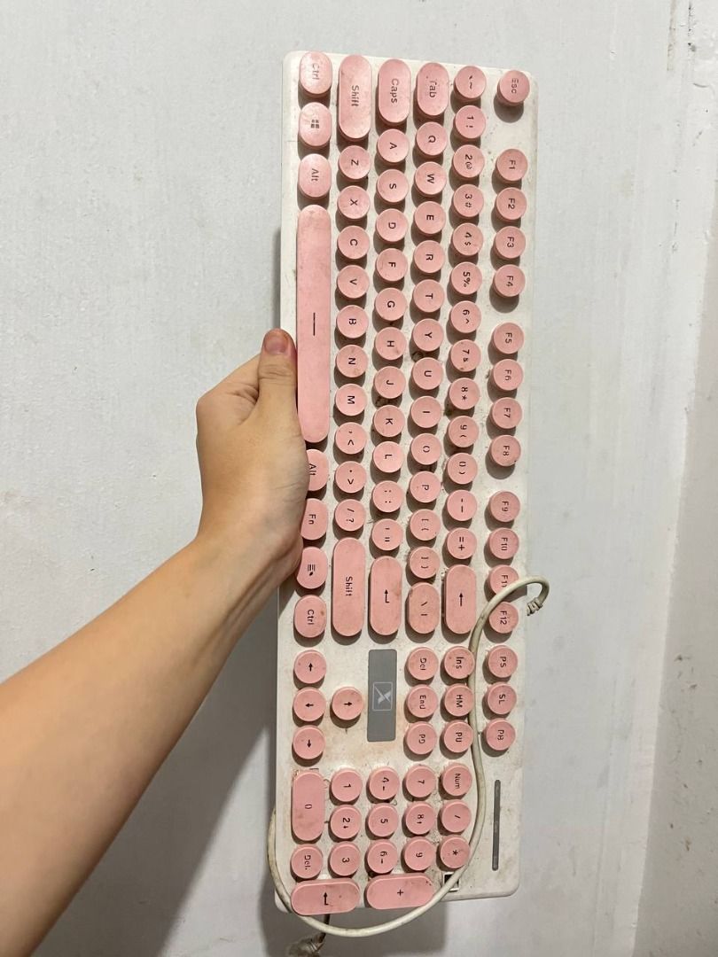 Pink Keyboard with Number Pad | Decluttering (Category: Computer Keyboard) located in Manila. Submitted by 60257 (Listing ID 1380040467, Image 1). Description: Selling my pink keyboard with number pad for only ₱180 With backlight (umiilaw) Dirty but still usable One keycap is missing, but all keys are working Selling as-is due to decluttering No box included.