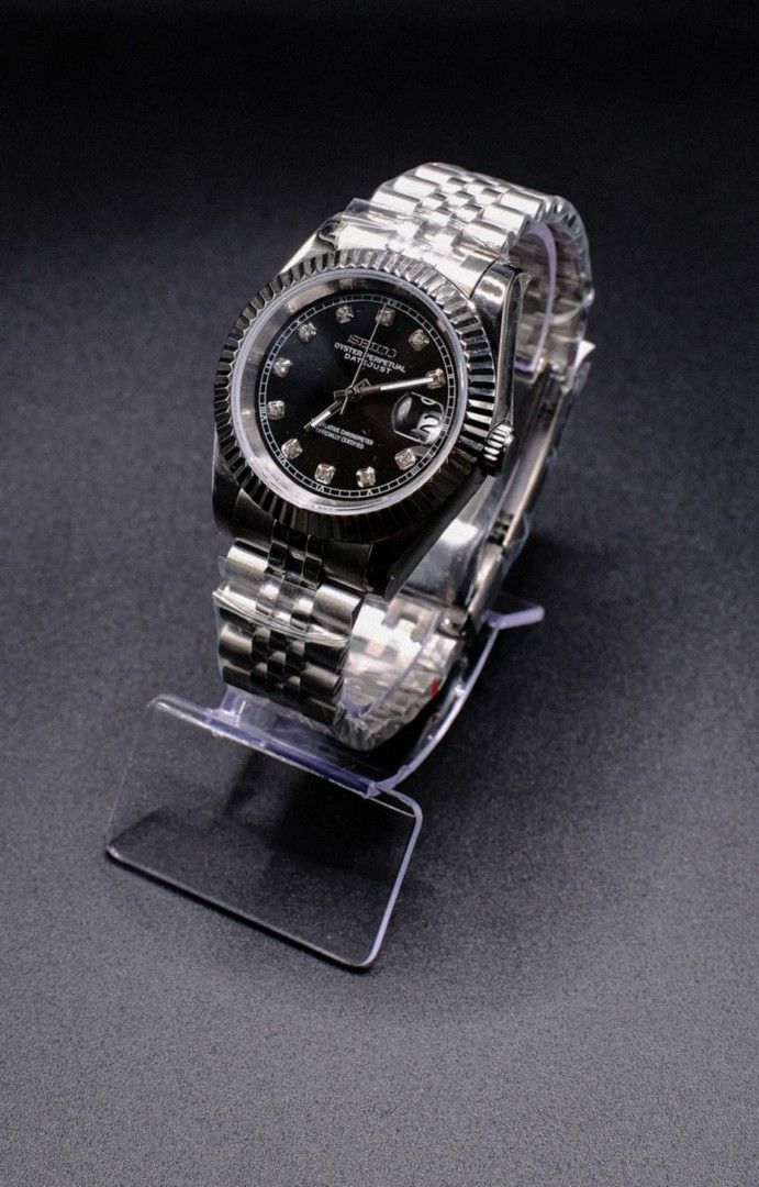 Seiko Mod Datejust Black Dial Diamonds (Category: Luxury Watches) located in Manila. Submitted by rafael_lesaguis (Listing ID 1379916403, Image 3). Description: BRANDNEW! Seiko Mod Datejust Black Dial Diamonds Movement: Seiko NH35 Automatic TMI version with winding and hacking feature Case and Strap: 39mm 904L Stainless Steel / Oyster Strap Dial: Seiko logo with diamond markers Glass: Sapphire scratch resistant Hands: Datejust hands Timegrapher c