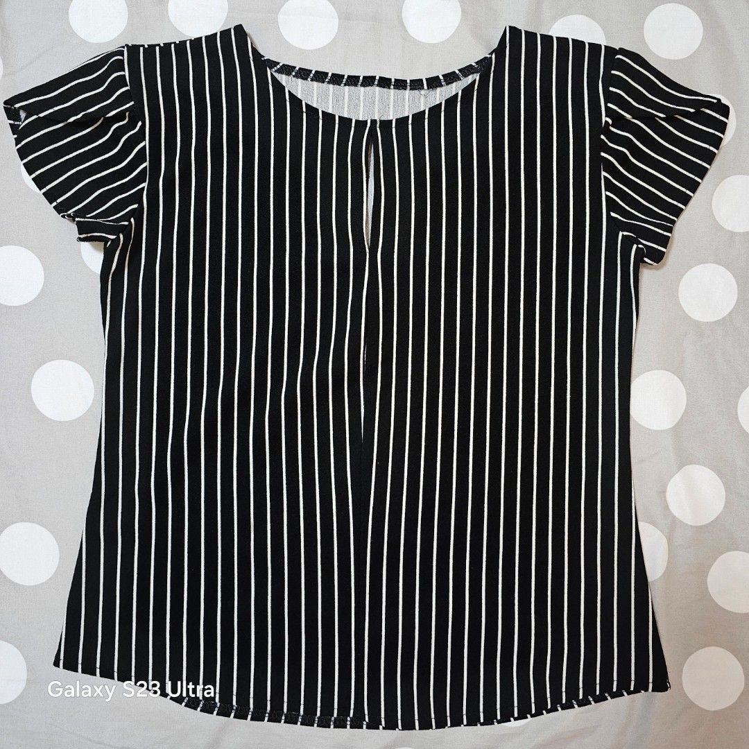 Stripes black and white soft blouse with peekaboo front (Category: Blouses) located in San Juan City. Submitted by love_tycoonj (Listing ID 1380086531, Image 1). Description: .