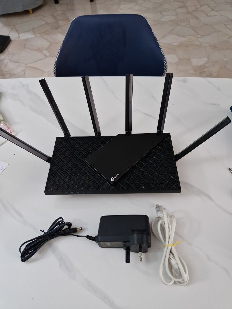 TP-Link Archer AX50 Wi-Fi 6 Router (Category: Networking) located in Singapore. Submitted by techn (Listing ID 1379956083, Image 1). Description: - TP-Link Archer AX50 Wi-Fi 6 Router - Includes power adapter and Ethernet cable - Excellent condition - Ready to set up and use - Fast and reliable Wi-Fi coverage.