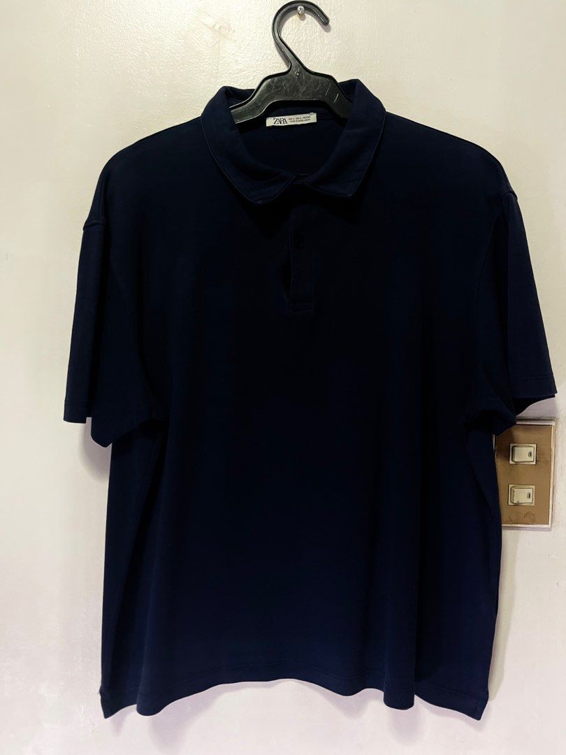 Zara Navy Blue Polo Shirt (Category: Tshirts & Polo Shirts ) located in Taguig. Submitted by andre2005 (Listing ID 1379989093, Image 1). Description: Dimensions: Chest: 21 inches Length: 25 inches Sleeves: 8.5 inches.