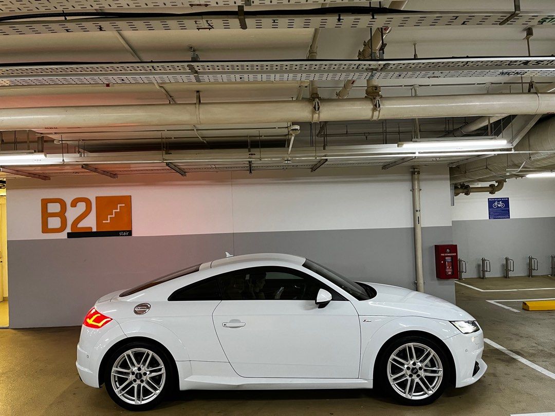 Audi TT Coupe 2.0 TFSI S tronic (A) (Category: Used Cars) located in Singapore. Submitted by bbf30 (Listing ID 1380166561, Image 1). Description: With fresh 10 years COE, massive savings from new! Extremely rare high spec Quattro unit with original factory S-Line trim and body kit. Perfect colour combo of glacier white with nougat brown nappa leather interior. Full Audi service records. No expense spared maintenance with receipts to prove. Probab