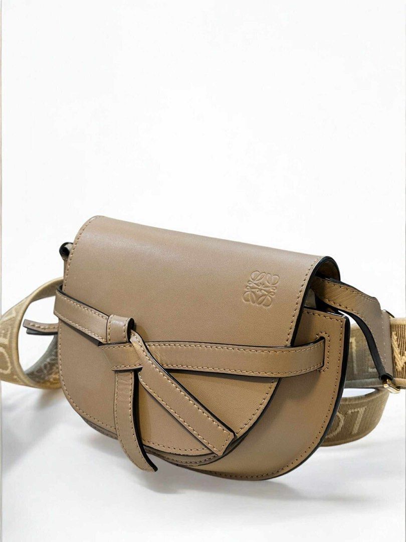 Authentic Loewe mini gate dual sand (Category: Luxury Bags & Wallets) located in Quezon City. Submitted by jhaediah (Listing ID 1380248615, Image 2). Description: Loewe mini gate dualh Sand Fits iphone pro max Inclusion: provided dusbag .