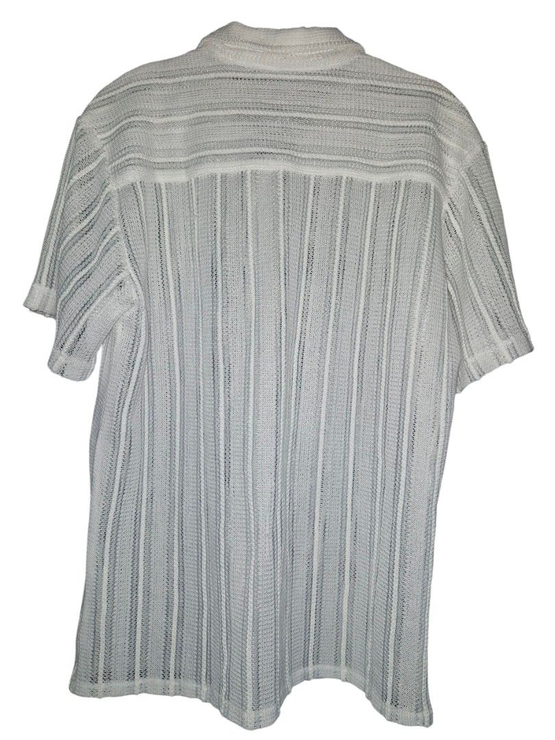 Beach Polo (Category: Swim Top & Rash Guards) located in Quezon City. Submitted by itstylerdurden (Listing ID 1380168386, Image 2). Description: Used once. Brand: No brand Size: Fits Medium to Large.