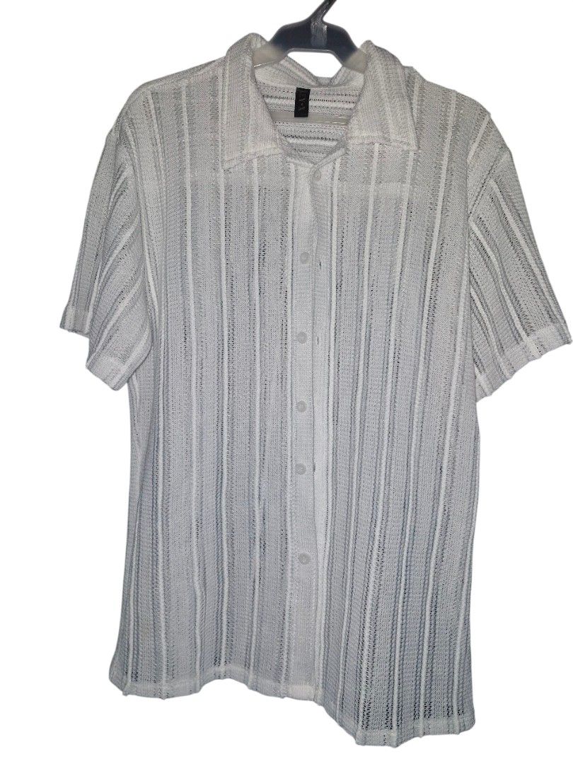 Beach Polo (Category: Swim Top & Rash Guards) located in Quezon City. Submitted by itstylerdurden (Listing ID 1380168386, Image 1). Description: Used once. Brand: No brand Size: Fits Medium to Large.