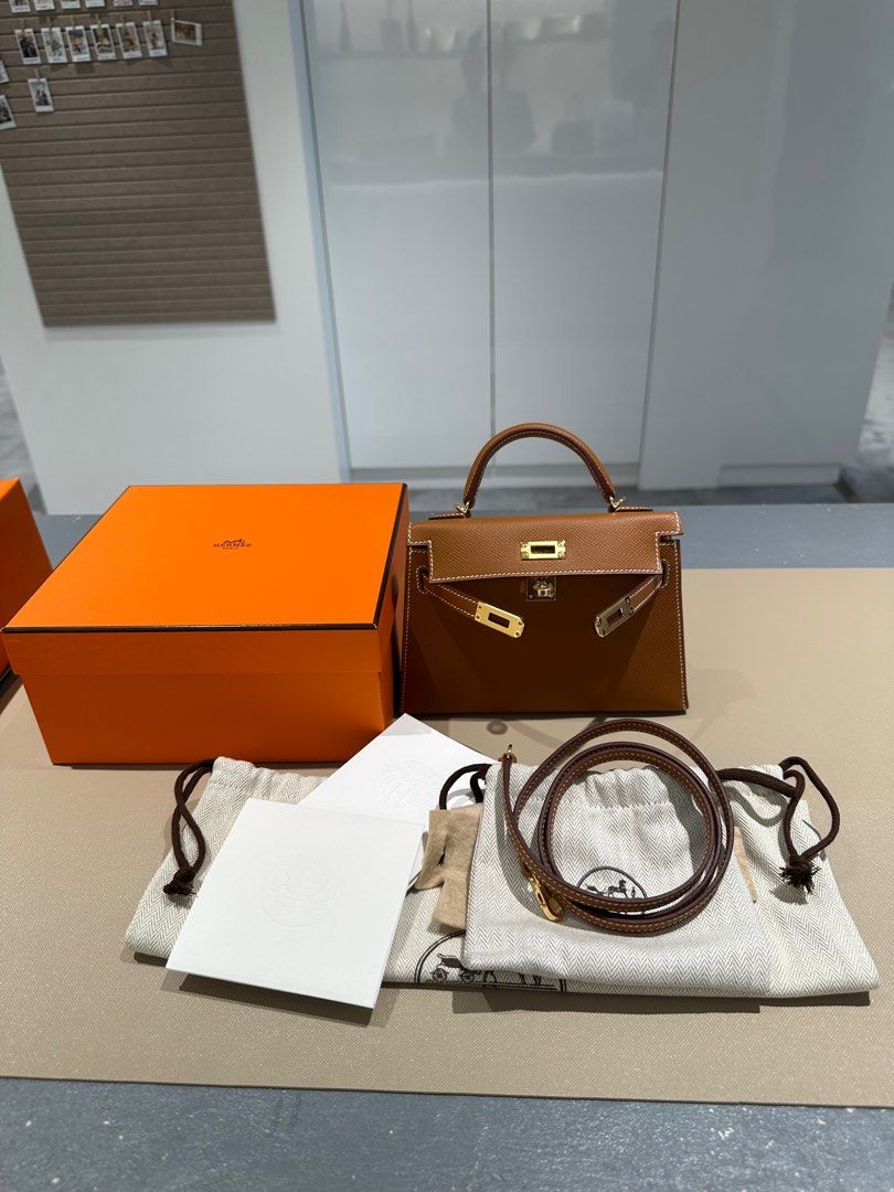 BN Hermes Mini Kelly Gold Epsom GHW (Category: Bags & Wallets) located in Singapore. Submitted by ginzaxiaoma.sg (Listing ID 1380188178, Image 3). Description: Comes with Box, receipt, felt, dustbag, strap, booklet Stamp K Category: Mini Kelly Color: Gold Material: Epsom Hardware: Gold Hardware N. 30032453 💯 Authenticity guaranteed Welcome to view before buying! Feel free to visit us, appointment preferred!! 📍23rd Floor 23-05/06, Ngee Ann City 