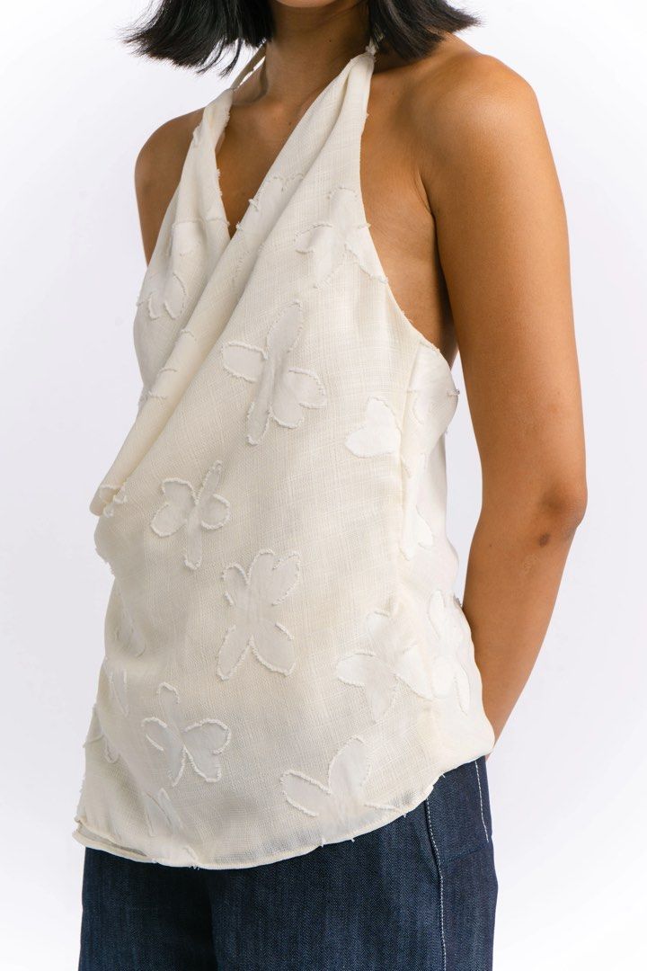 BNWT Carino Silvia Top (Category: Sleeveless) located in Pasig City. Submitted by exlim (Listing ID 1380267135, Image 1). Description: Brand new M size Sylvia Top in White Floral Chiffon Never used and brand new with tag.