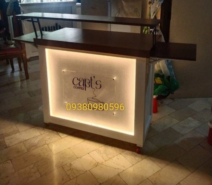 Collapsible mobile cart (Category: Tables & Sets) located in Manila. Submitted by efghiwoodwork (Listing ID 1380110134, Image 3). Description: 6k only collapsible mobile cart ✨ ✅ Lights ✅ Wheels ✅ Painted/varnished 7k only collapsible mobile cart w/side table ✨ ✅ Lights ✅ Wheels ✅ Painted/varnished ✅Side table customize additional 2k for acrylic logo,fluted panel, hydraulic,etc. Location CAMARIN CALOOCAN 📍.