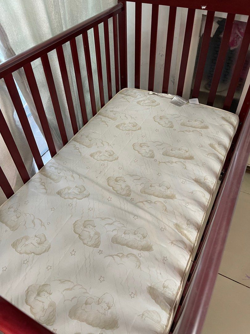 Convertible Crib & Mattress (Category: Cots & Cribs) located in Binan City. Submitted by tinayy_30 (Listing ID 1380132464, Image 3). Description: Up to 5 years of age! Easy to assemble ✅ Barely used, natambakan lang ng mga damit hehe. Ayaw ng baby ko humiwalay samin sa pag tulog 🥲 Like new! Has minimal scratches but very like new! Bought this around 10k with mattress Pick up: Biñan.