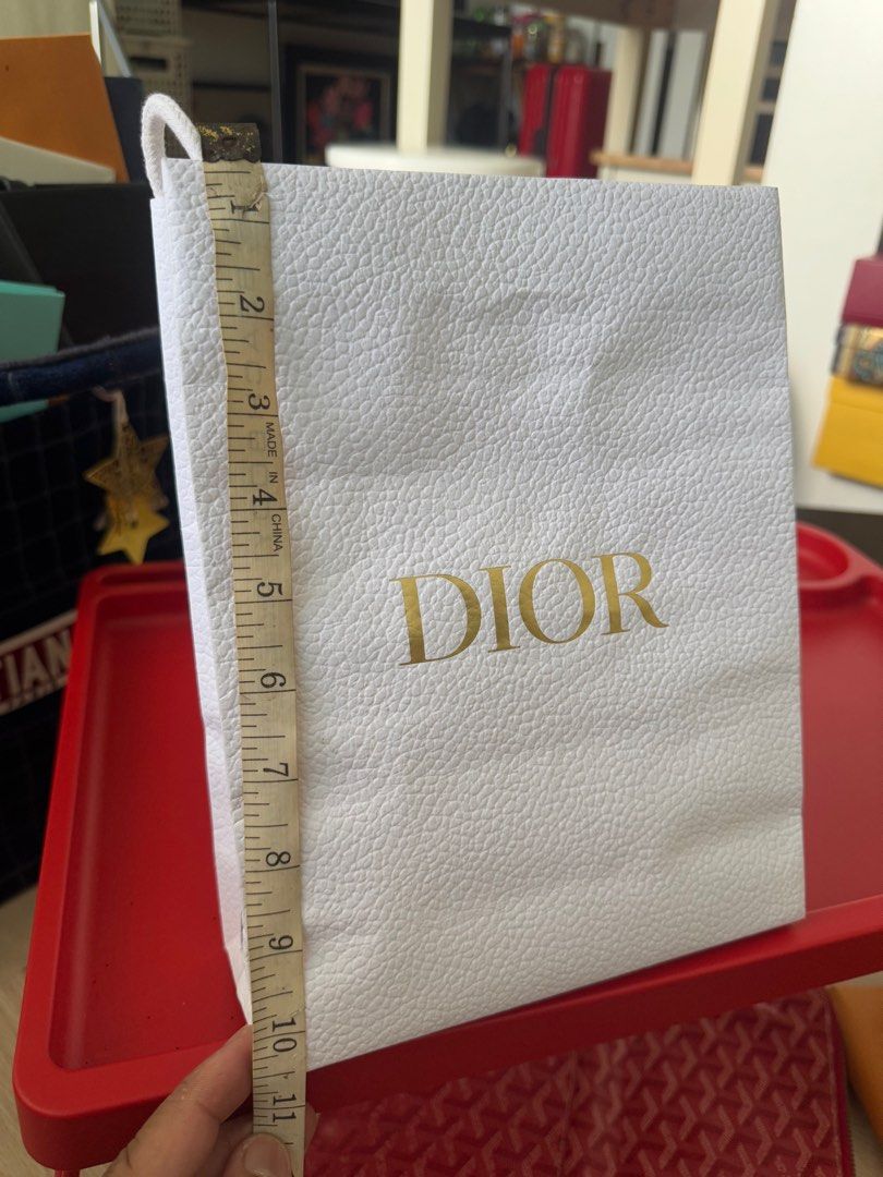 Dior paperbag (Category: Luxury Bags & Wallets) located in Quezon City. Submitted by raphael1986 (Listing ID 1380135040, Image 1). Description: Money back if proven fake ( shipping shouldered by the buyer I’m from qc) .