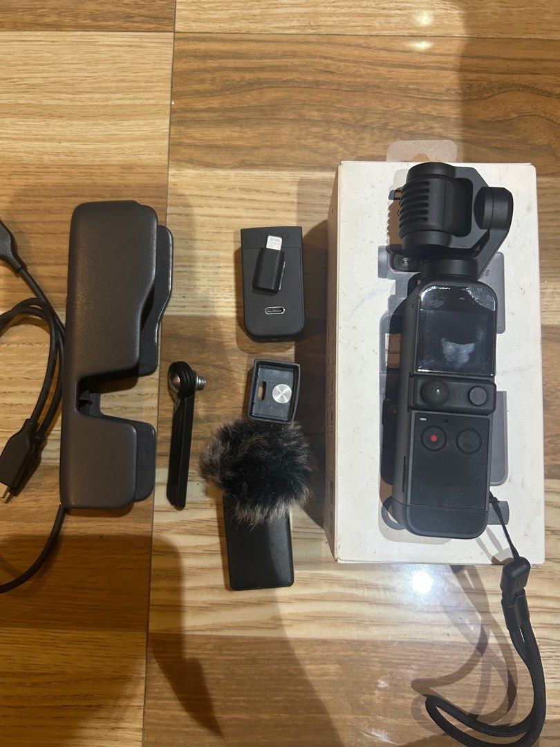 DJI OSMO POCKET 2 (Creator Combo) (Category: Video Cameras) located in El Nido. Submitted by isla.vintage (Listing ID 1380261233, Image 1). Description: DJI Osmo Pocket 2 - Female-owned RUSH SALE‼️‼️ - no free sd card Comes with all the items in the Creater Combo. NO ISSUES. It also has a screen protector and you can just purchase a new one. Bought this a year ago and have only used it for my Korea and Indonesia Trip. .