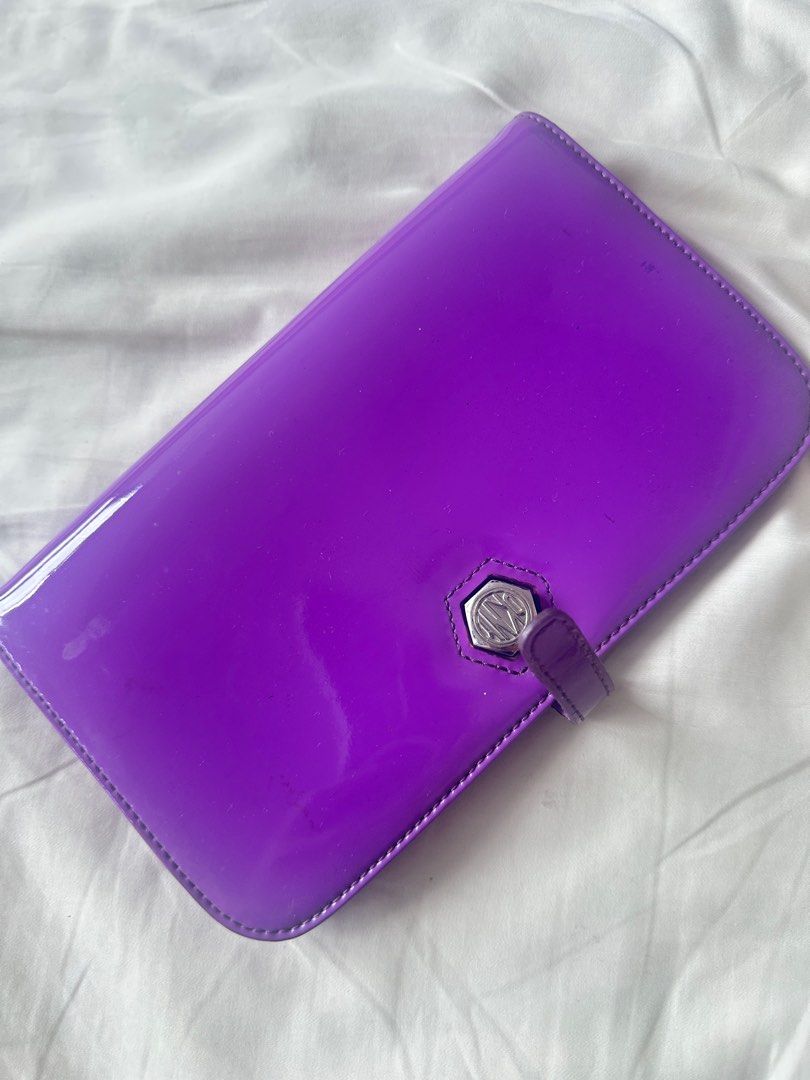 DKNY organizer Wallet purple (Category: Luxury Bags & Wallets) located in Makati City. Submitted by maria_k_tan (Listing ID 1380182603, Image 1). Description: .