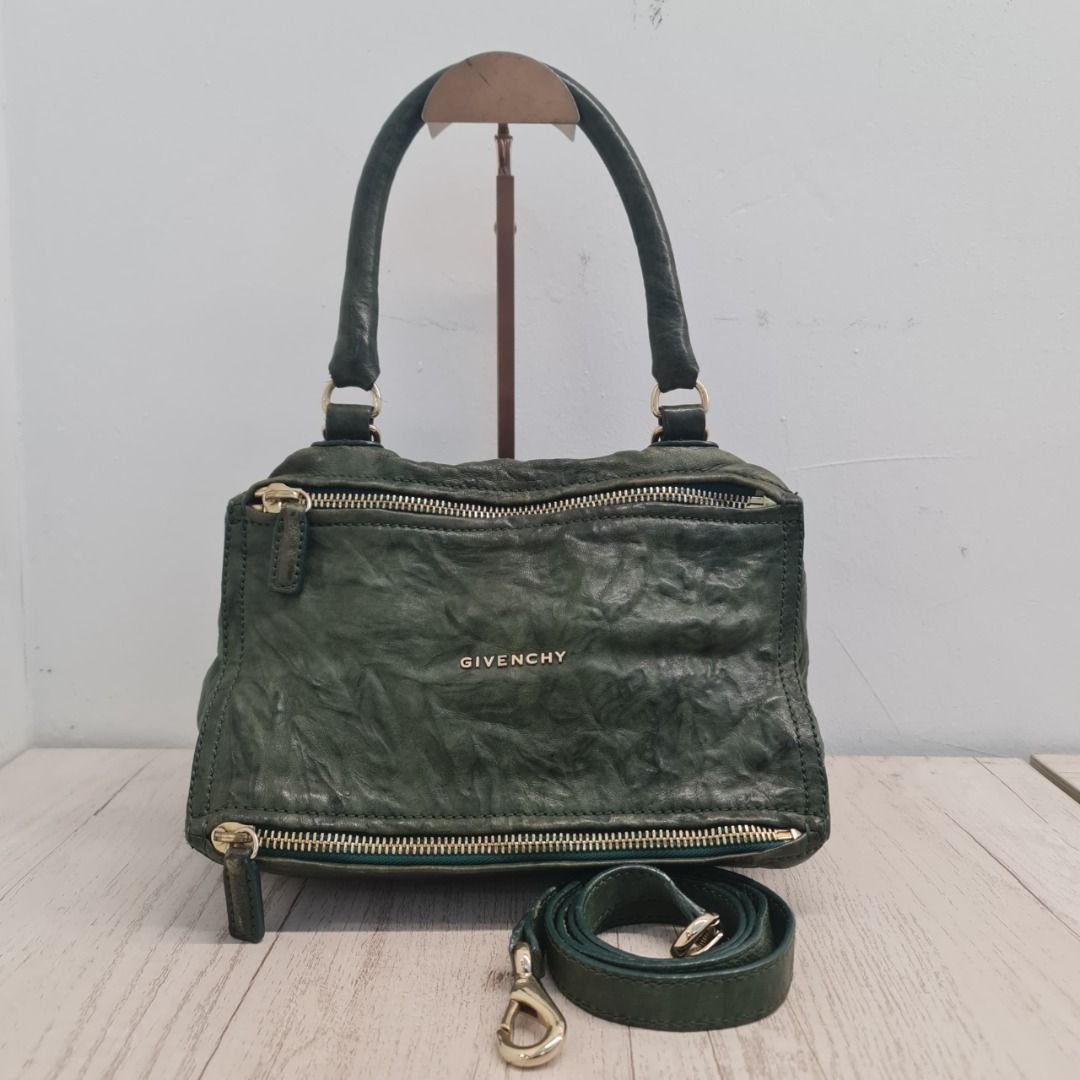 GIVENCHY PANDORA EF0512 PANDORA SMALL DARK GREEN DISTRESSED SHEEPSKIN LEATHER GHW (Category: Bags & Wallets) located in Kuala Lumpur. Submitted by larueonlinestore (Listing ID 1380120453, Image 1). Description: LAR-4011-GIV (Pre-owned) Brand - GIVENCHY Model - PANDORA EF0512 Size - 28CM Color - DARK GREEN Material - SHEEPSKIN LEATHER & GHW Accessories - STRAP Condition - USED Visit our store to view the actual product P-1-17 Plaza Damas, Jalan Sr