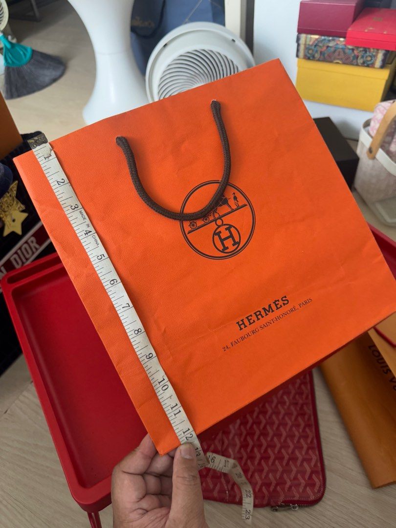 Hermes paper bag (Category: Luxury Bags & Wallets) located in Quezon City. Submitted by raphael1986 (Listing ID 1380133786, Image 1). Description: Money back if proven fake ( shipping shouldered by the buyer I’m from qc) .