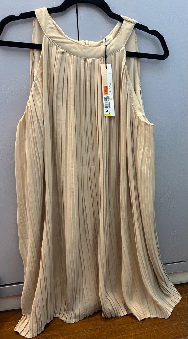 Kashieca gold drop down dress (Category: Dresses) located in Muntinlupa City. Submitted by Izza_MD (Listing ID 1380150204, Image 1). Description: Kashieca dress, pleated Bought on sale but got wrong size Size: Medium Price: Php 450 .