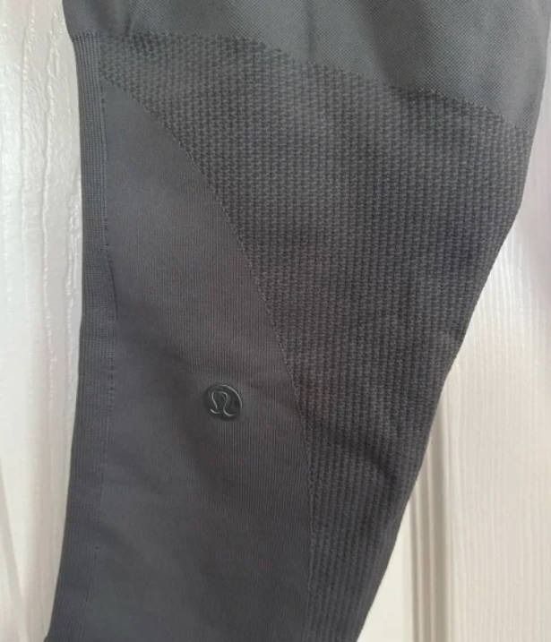Lululemon Athletica Q5 Compression Leggings in Charcoal Grey Crossfit Cross Training Yoga Activewear (Category: Activewear) located in Singapore. Submitted by sparkssea (Listing ID 1380242439, Image 3). Description: -Measurements: Waist 26CM (Stretchable up to 36CM), Length 76CM -Fabric Type: Stretchable Knit -Made up of 91% Nylon, 9% Elastane -Compression Leggings with Elastic Waistband, Moisture Wicking, Stretchable Waistband -Lululemon Size 2 