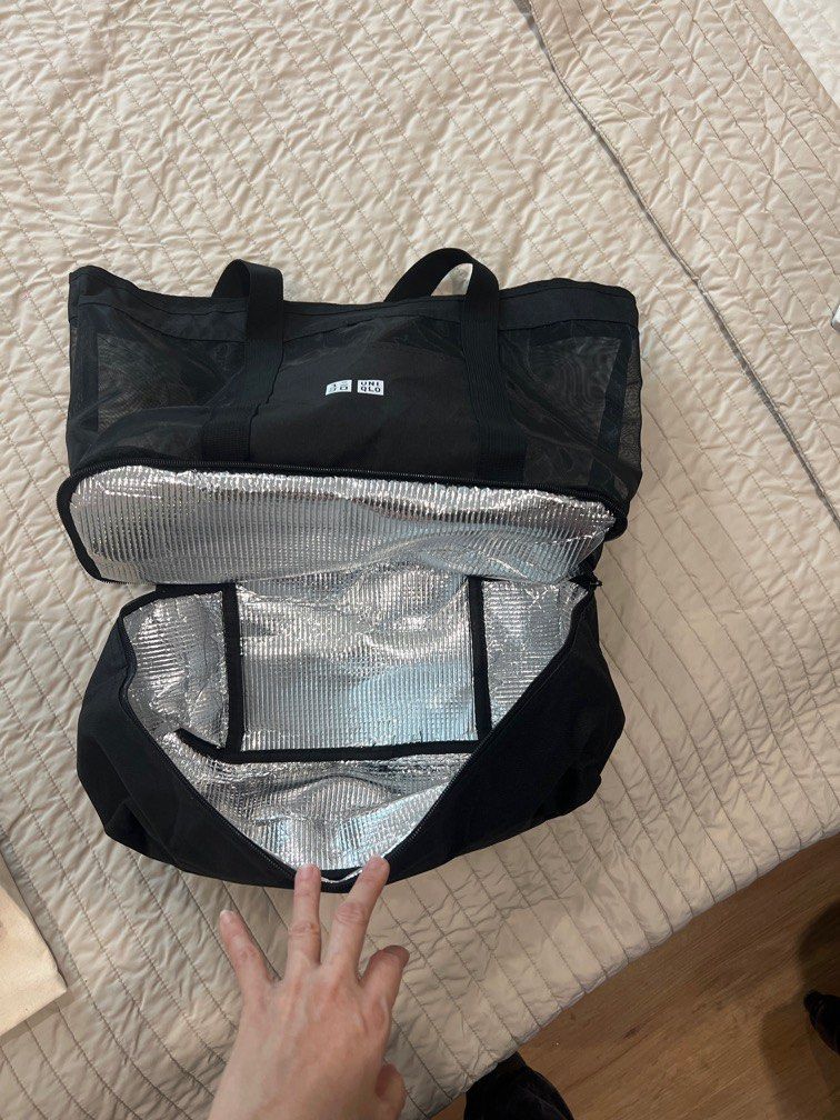 Medium size tote bag ( with waterproof pocket at bottom ) (Category: Tote Bags) located in Kuala Lumpur. Submitted by leefongpf51473 (Listing ID 1380146767, Image 1). Description: Brand new Uniqlo tote bag , very user friendly, got compartment at the bottom can keep food warm & water proof ( many usage ).