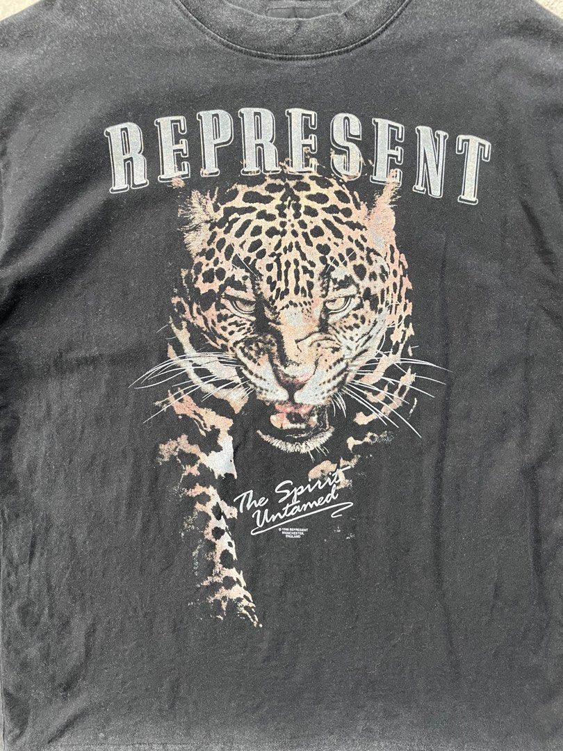 Represent "The Spirit Untamed" Graphic Tee (Category: Tshirts & Polo Shirts ) located in Santiago. Submitted by ace.stuff (Listing ID 1380228932, Image 3). Description: No issues Like new Vintage washed Small on tag fits large 22x28.5.
