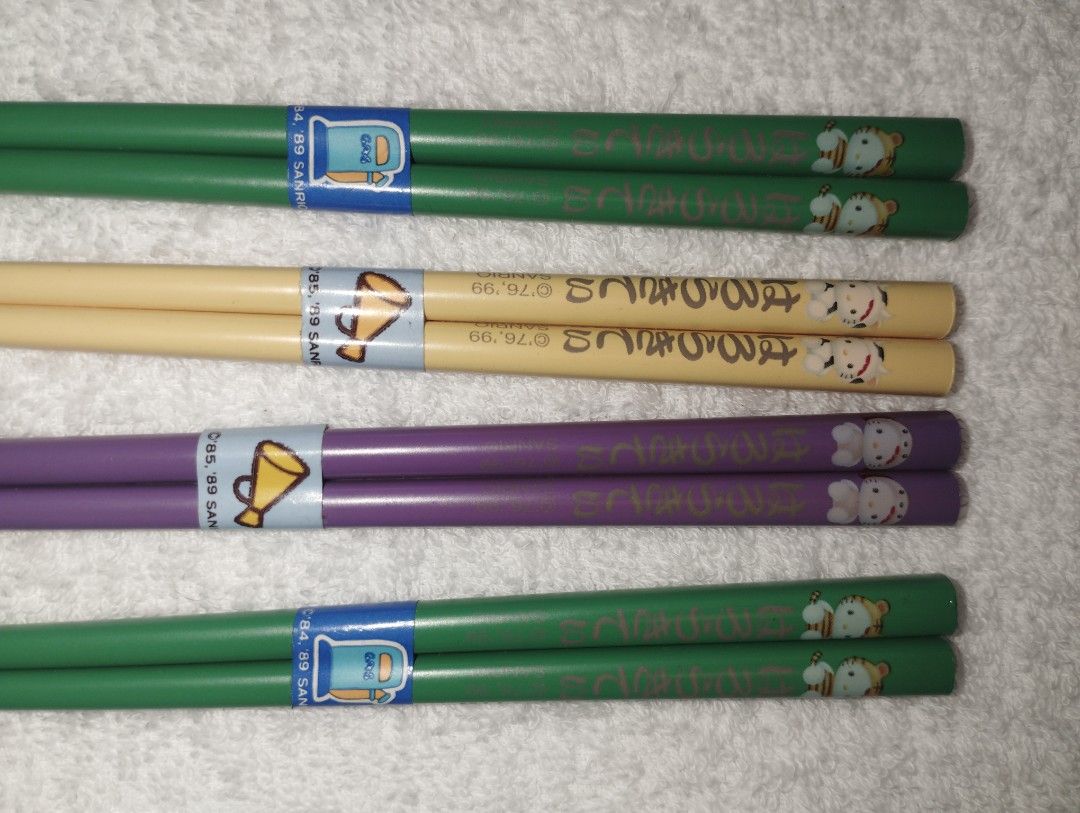 Sanrio Hello Kitty Collectible Chopsticks (Category: Dinnerware & Cutlery) located in Muntinlupa City. Submitted by fnovelties (Listing ID 1380226455, Image 2). Description: Sanrio brand Hello Kitty Chopsticks 2 pairs green (identical) 1 pair yellow 1 pair purple 18 cm rfs: decluttering.