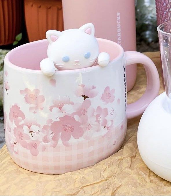 Starbucks Sakura Mug (Category: Coffee & Tea Tableware) located in Taguig. Submitted by looouuuiii (Listing ID 1380274348, Image 1). Description: With cute cat tea bag holder China released MOP: BPI or Seabank MOD: J&T, Flash, Seabank or BPI.