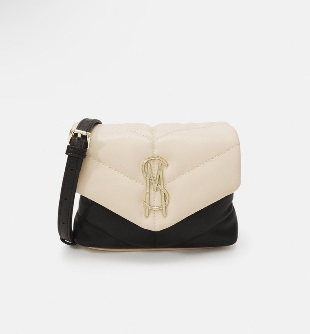 Steve Madden Quilted Crossbody Bag Puffy Sling Bag (Category: Bags & Wallets) located in Singapore. Submitted by haru.u (Listing ID 1380192619, Image 1). Description: Brand new puffy bag and authentic! Clearing because too many bags.