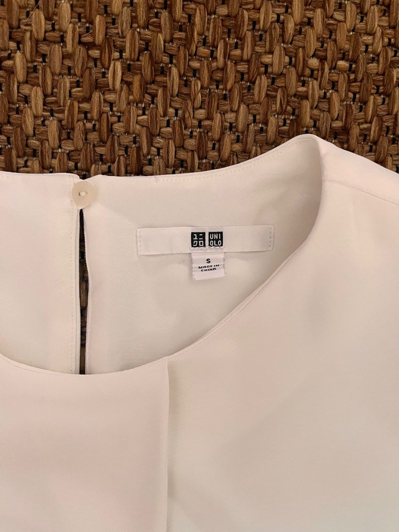 Uniqlo Tops (Category: Sleeveless) located in Paranaque City. Submitted by threadup (Listing ID 1380109777, Image 3). Description: Selling as a bundle. Size Small. Good condition..