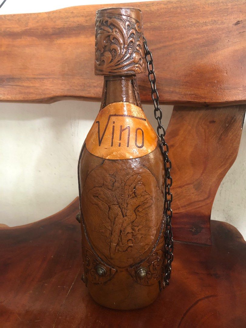 Vintage Vino Leather Empty Wine Decanter, Spain (Category: Wine Cellar & Storage) located in Imus. Submitted by ABrielleC (Listing ID 1380199295, Image 1). Description: Made in Spain Empty Wine Bottle Covered with Leather Capacity-1liter Height-13inches First to pay Loc Imus Cavite.