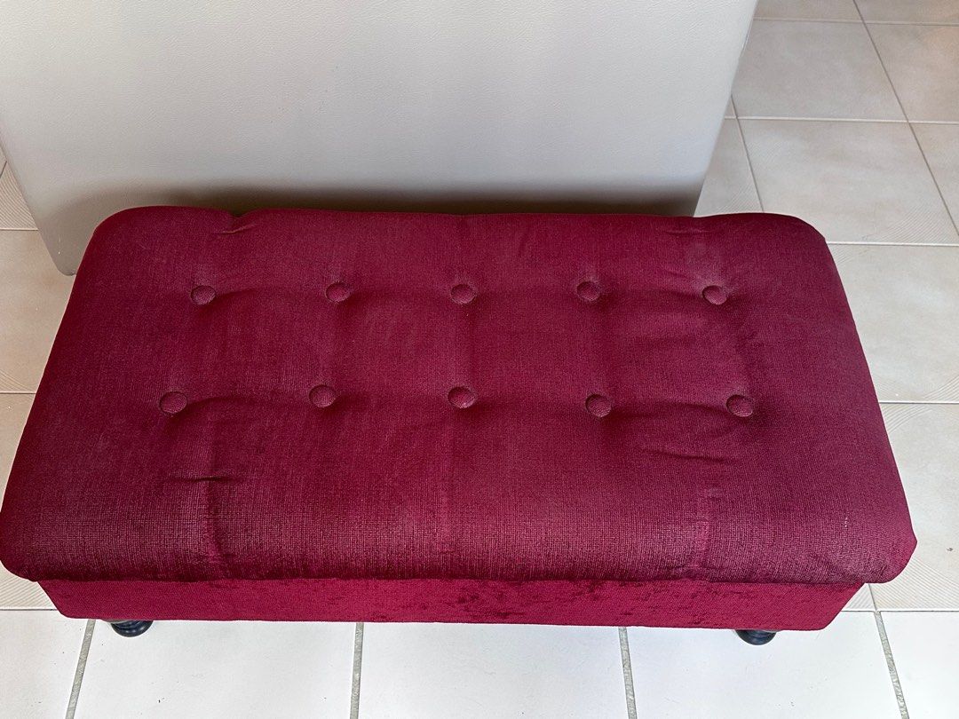 Burgundy Storage Ottoman (Category: Other Home Furniture) located in Singapore. Submitted by soniacastro175 (Listing ID 1380326164, Image 2). Description: Stylish burgundy ottoman with button detailing. Features a hinged lid for storage. The interior is lined with black fabric. Perfect for storing blankets, pillows, or other items. The ottoman is in excellent condition..