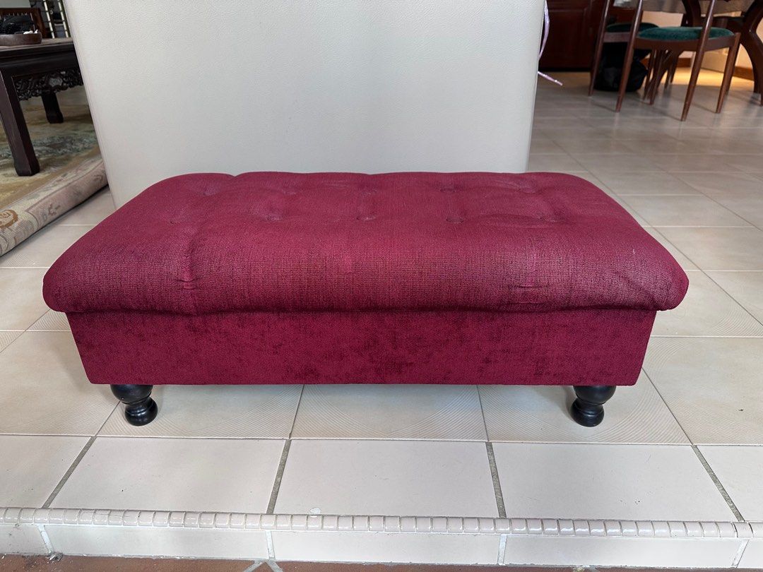 Burgundy Storage Ottoman (Category: Other Home Furniture) located in Singapore. Submitted by soniacastro175 (Listing ID 1380326164, Image 1). Description: Stylish burgundy ottoman with button detailing. Features a hinged lid for storage. The interior is lined with black fabric. Perfect for storing blankets, pillows, or other items. The ottoman is in excellent condition..