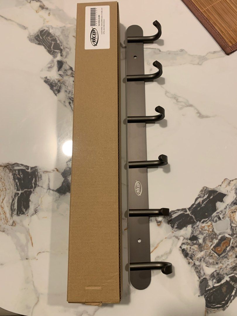 Clothes Hook - 6 hooks (Category: Hooks & Hangers) located in Singapore. Submitted by BigMonk (Listing ID 1380469721, Image 1). Description: Clothes Hook . Gun metal colour 6 hooks . 44cm x 6cm 4.2cm Aluminum Brand new set.
