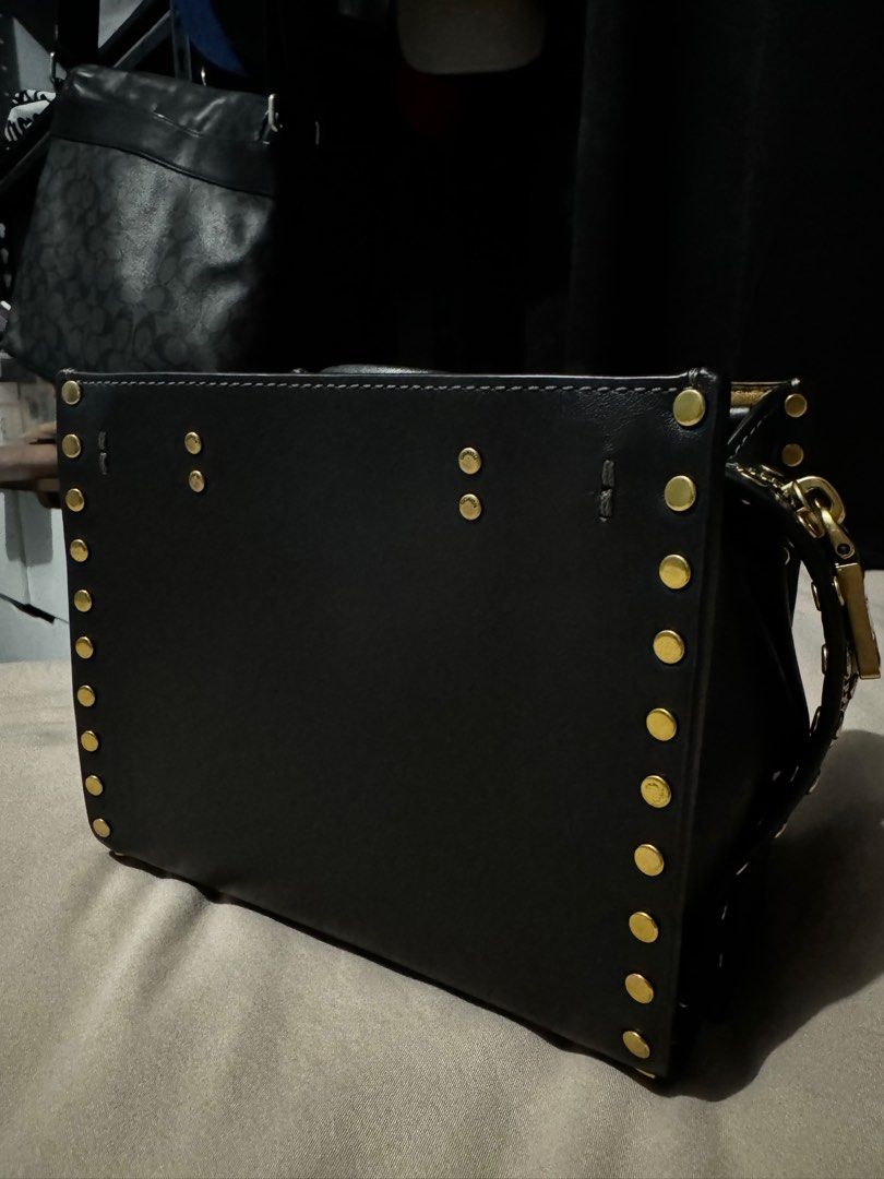 Coach Rogue 17 with rivets in black (Category: Cross-body Bags) located in Manila. Submitted by marj_yyy (Listing ID 1380403230, Image 3). Description: Hi! Selling this coach rogue 17 with rivets in black calf skin - like new and very nice in person. Includes dust bag and paper bag and receipt. Bought from Shang Coach for 29k. Rfs: too many of the same style .
