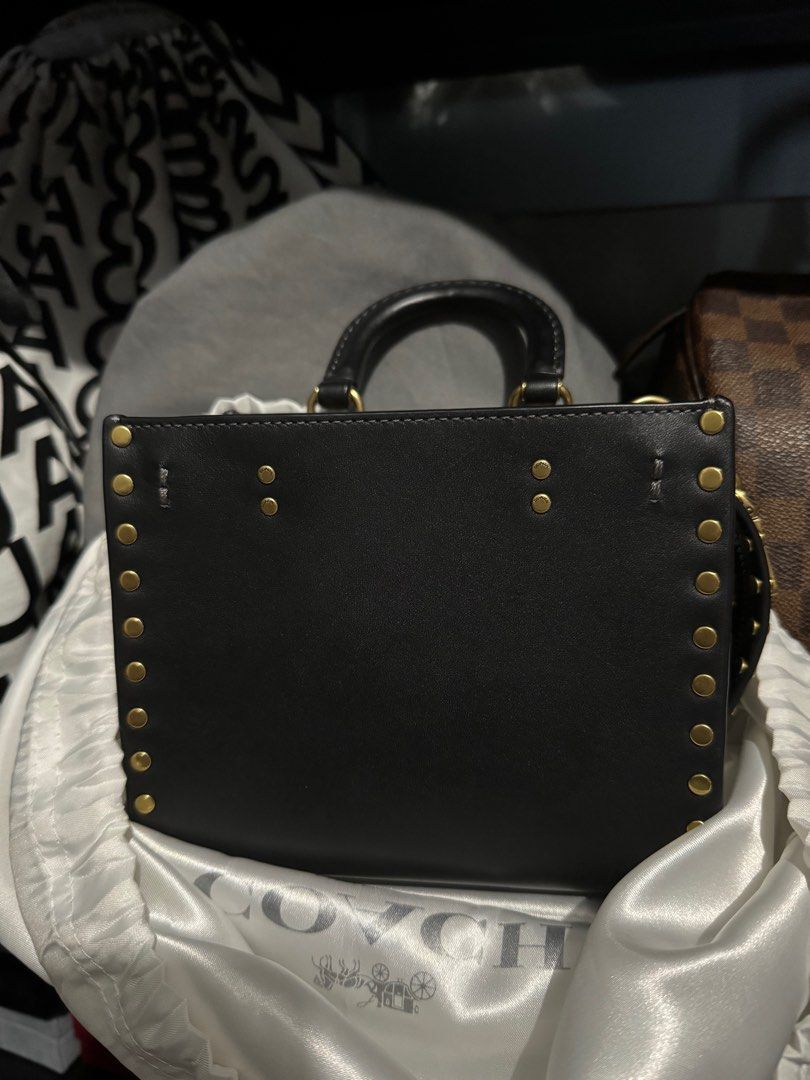 Coach Rogue 17 with rivets in black (Category: Cross-body Bags) located in Manila. Submitted by marj_yyy (Listing ID 1380403230, Image 1). Description: Hi! Selling this coach rogue 17 with rivets in black calf skin - like new and very nice in person. Includes dust bag and paper bag and receipt. Bought from Shang Coach for 29k. Rfs: too many of the same style .