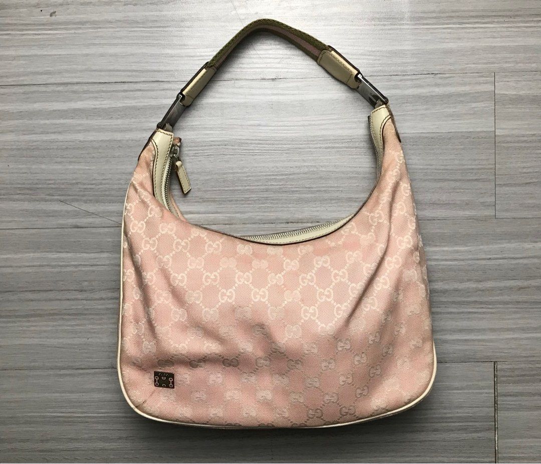 Gucci GG Monogram Croissant Hobo Bag (Category: Luxury Bags & Wallets) located in Cabanatuan. Submitted by cabsygoods (Listing ID 1380433916, Image 1). Description: Gucci GG Monogram Croissant Hobo Bag Very good condition Issue removable stain Color rate 9/10 Dm to purchase! 📩.