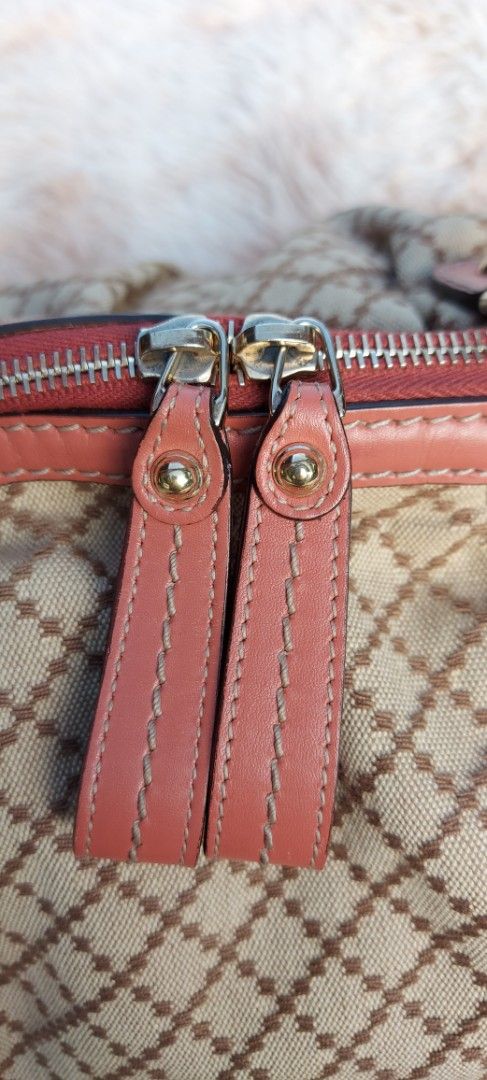 GUCCI SUKEY CANVAS HANDBAG (Category: Luxury Bags & Wallets) located in Davao. Submitted by fucollections (Listing ID 1380375064, Image 3). Description: Preowned. Lining material canvas Hardware - gold plated With sign of used inside like pen mark, stain but body outside is good. Can send more pictures for sure buyer..
