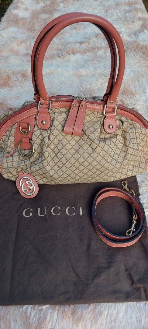 GUCCI SUKEY CANVAS HANDBAG (Category: Luxury Bags & Wallets) located in Davao. Submitted by fucollections (Listing ID 1380375064, Image 1). Description: Preowned. Lining material canvas Hardware - gold plated With sign of used inside like pen mark, stain but body outside is good. Can send more pictures for sure buyer..