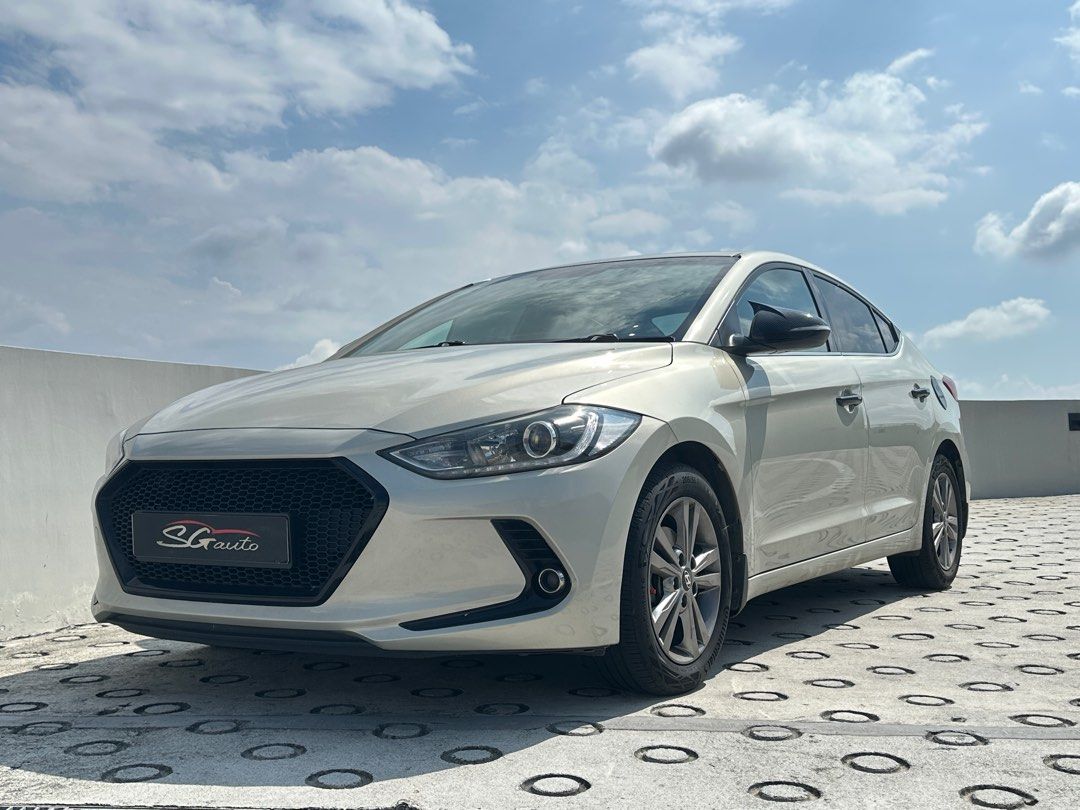 Hyundai Elantra 1.6 Elite (A) (Category: Used Cars) located in Singapore. Submitted by tommmmm_ (Listing ID 1380317138, Image 1). Description: 🚘 Hyundai Elantra Elite – Fully Optioned | Ventilated Seats | Blind Spot Monitor | Fuel Efficient This Hyundai Elantra Elite is packed with premium features and thoughtful upgrades — perfect for those who value comfort, tech, and peace of mind. With a sleek profile, excellent fuel economy, and a host of l