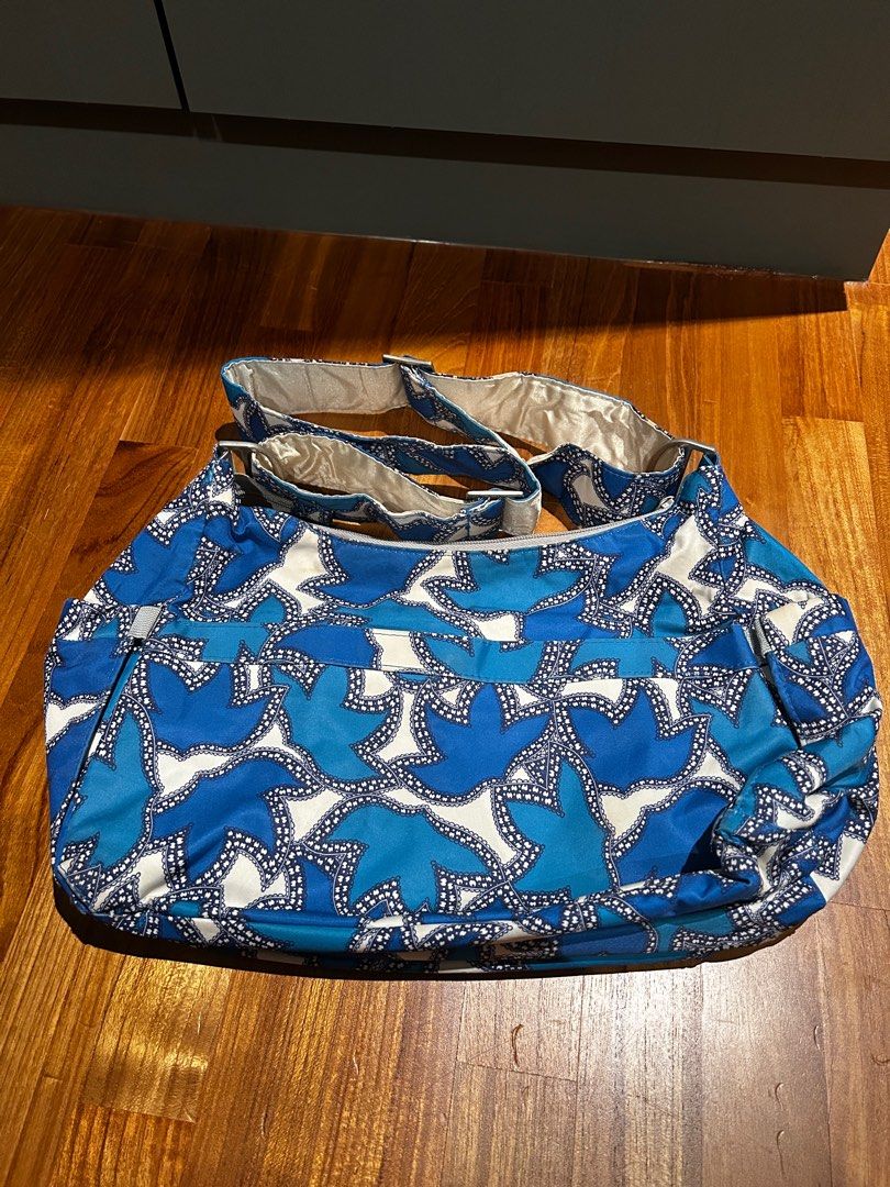 jujube hobobe in lavender leaves diaper handbag bag (Category: Diaper Bags & Wetbags) located in Singapore. Submitted by glitterglamglow (Listing ID 1380439188, Image 2). Description: Well loved but functional jujube hobobe Diaper handbag sling bag Still in usable condition No major defects Some corner wear visible but no holes Take note the shoulder pad was unpicked Priced to sell Price firm No self collect Add for postage $2.50 normal mail $3.5