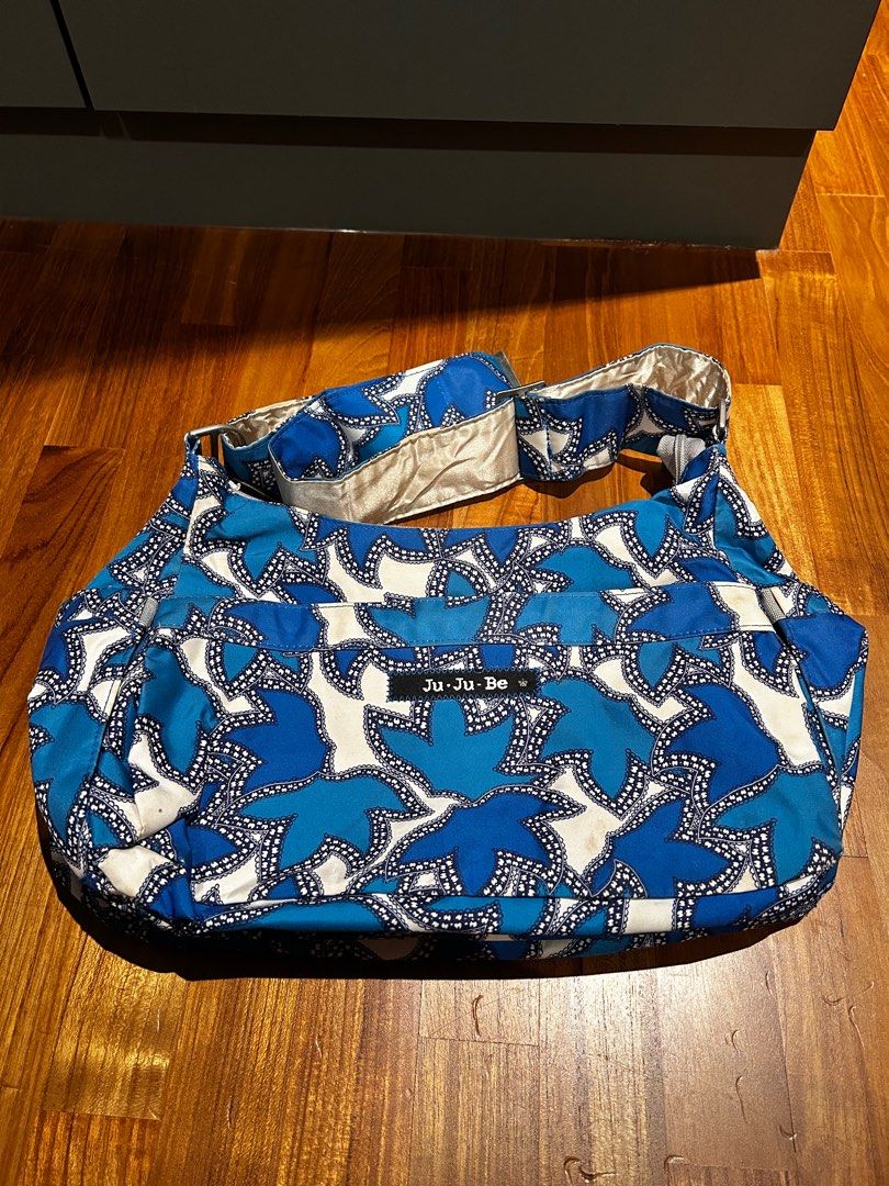 jujube hobobe in lavender leaves diaper handbag bag (Category: Diaper Bags & Wetbags) located in Singapore. Submitted by glitterglamglow (Listing ID 1380439188, Image 1). Description: Well loved but functional jujube hobobe Diaper handbag sling bag Still in usable condition No major defects Some corner wear visible but no holes Take note the shoulder pad was unpicked Priced to sell Price firm No self collect Add for postage $2.50 normal mail $3.5