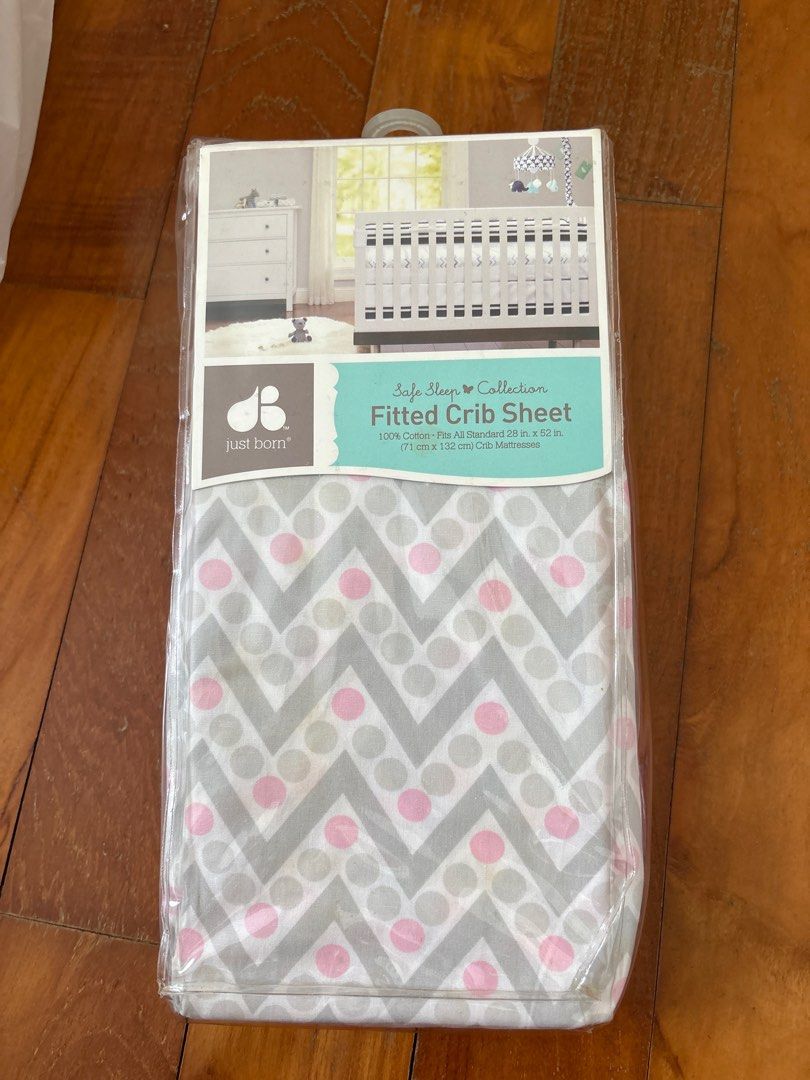 Just Born Safe Sleep Fitted Crib Sheet (Category: Cots & Cribs) located in Singapore. Submitted by J.cooper (Listing ID 1380362919, Image 2). Description: Brand new, unopened Just Born Safe Sleep fitted crib sheet. Features a cute chevron and polka dot pattern in grey, pink, and white. Made of 100% cotton. Fits a standard crib mattress..