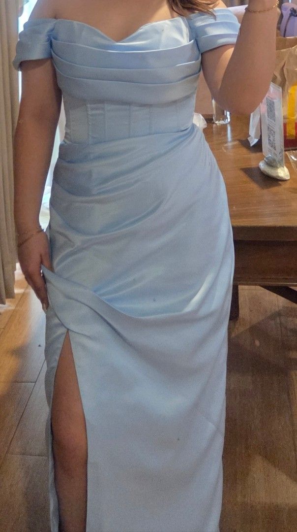 Light blue gown (Category: Evening dresses & gowns) located in Manila. Submitted by brch_ (Listing ID 1380480237, Image 2). Description: For rent or sale dress for only 1k! With 1k security deposit. Babalik din pag balik ng dress 🙂 For sale for 2,500 Bought for 5,000 sa divisoria For reference: Medium to Large frame - Di-tali yung likod kaya adjustable 😁 Height ko is 5'1 + 3 inches na heels Nasa left leg yung slit super comfy ng dress makakasay