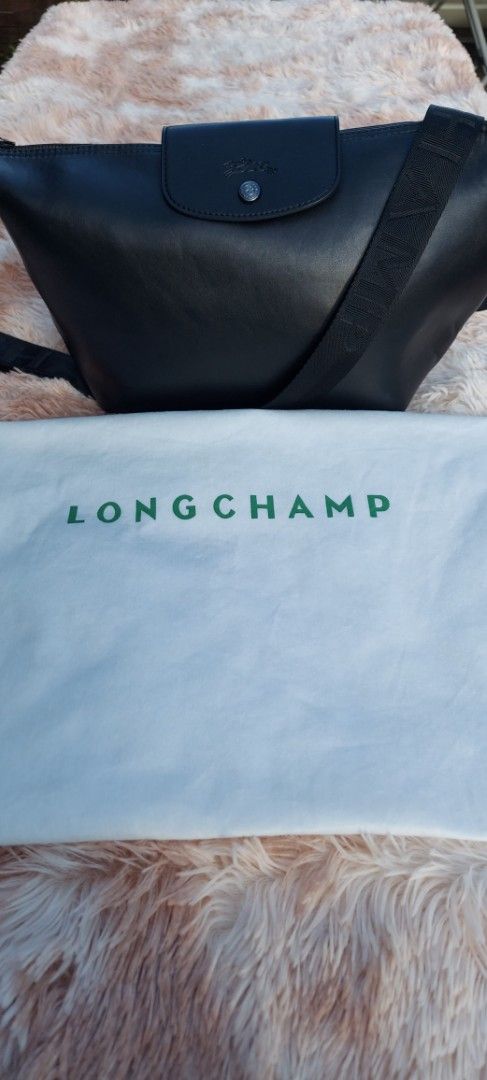 LONG CHAMP CROSS BODY BAG IN SOFT LEATHER (Category: Luxury Bags & Wallets) located in Davao. Submitted by fucollections (Listing ID 1380380893, Image 1). Description: Preowned. Very light weight, seldom used. Bought from "The Bag Master". Will send more pictures for sure buyer..