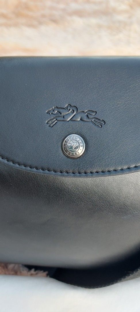 LONG CHAMP CROSS BODY BAG IN SOFT LEATHER (Category: Luxury Bags & Wallets) located in Davao. Submitted by fucollections (Listing ID 1380380893, Image 2). Description: Preowned. Very light weight, seldom used. Bought from "The Bag Master". Will send more pictures for sure buyer..