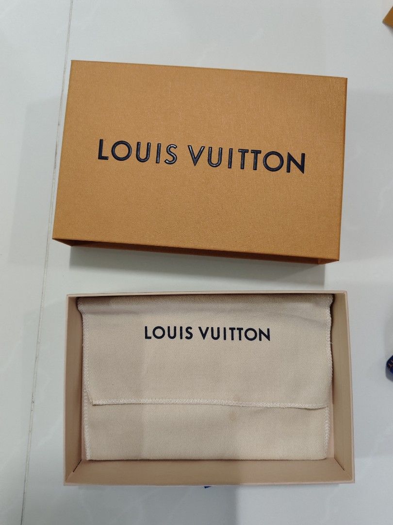 Louis Vuitton passport holder Box and paper bag set (Category: Accessories) located in Singapore. Submitted by rabbit8682 (Listing ID 1380321166, Image 2). Description: - Authentic Louis Vuitton box set - Includes original box, dust bag, ribbon, and card - Perfect for gifting or storage - Good condition From Paris.