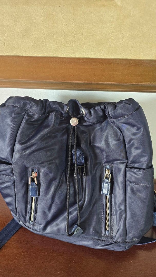 Marc by Marc Jacobs Palma Backpack (Category: Luxury Bags & Wallets) located in Malolos. Submitted by ciantin (Listing ID 1380379372, Image 2). Description: 100% Authentic. No dust bag and cards. Bought from the US. 9/10 Rarely Used from website: - Poly fabric exterior and lining - Adjustable shoulder straps - Flap top with drawstring and push lock closure - Exterior slit and zipper pockets - Interior zipper pockets - Measures approx 30 cm W x 46