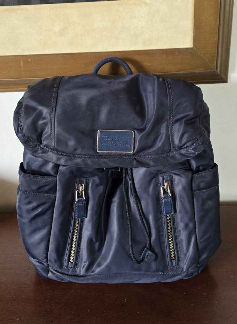 Marc by Marc Jacobs Palma Backpack (Category: Luxury Bags & Wallets) located in Malolos. Submitted by ciantin (Listing ID 1380379372, Image 1). Description: 100% Authentic. No dust bag and cards. Bought from the US. 9/10 Rarely Used from website: - Poly fabric exterior and lining - Adjustable shoulder straps - Flap top with drawstring and push lock closure - Exterior slit and zipper pockets - Interior zipper pockets - Measures approx 30 cm W x 46