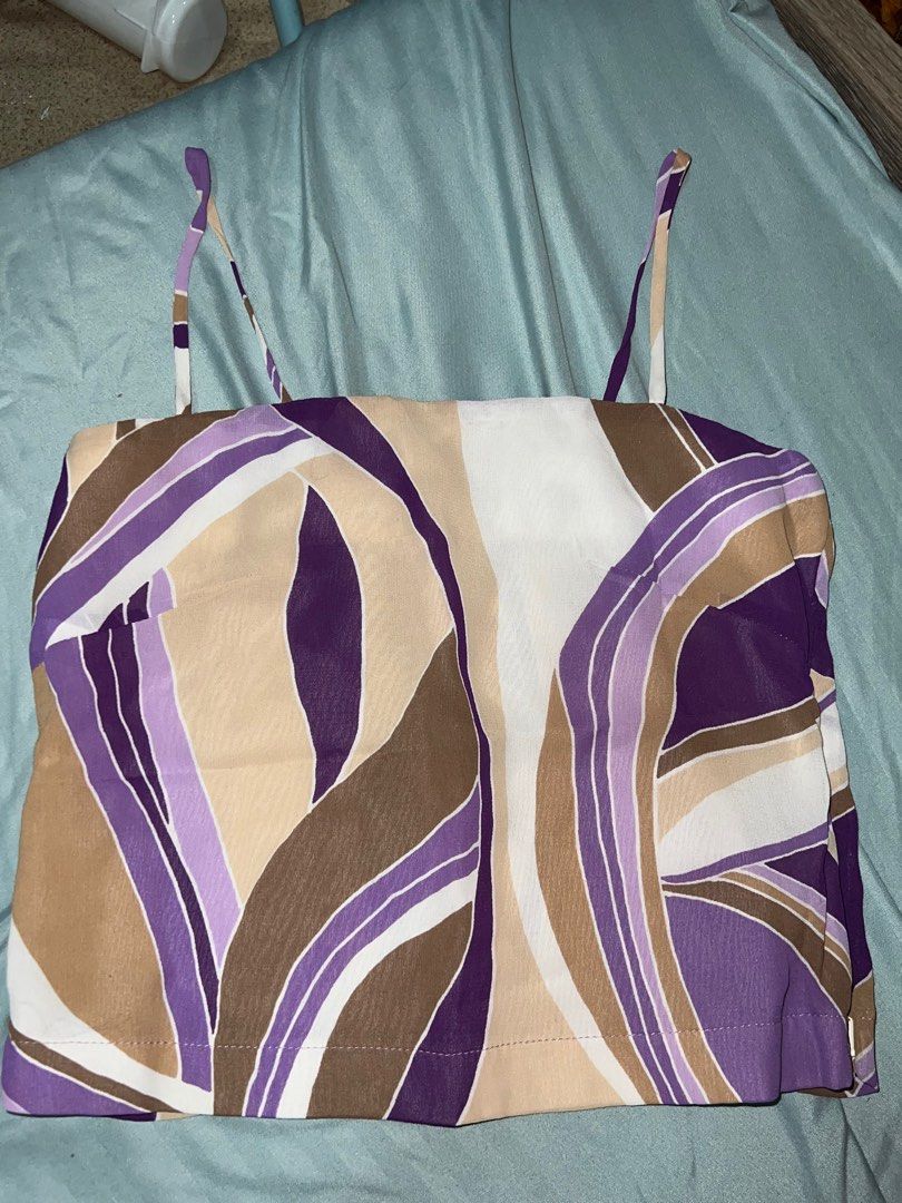 NAF NAF Purple Tank Top (Category: Sleeveless) located in Manila. Submitted by declutter365days (Listing ID 1380323266, Image 1). Description: NAF NAF Purple Top Favorite Top as well. Rfs: Doesn’t fit me anymore Really really really good quality Brand is from Paris There’s a zipper on the side .