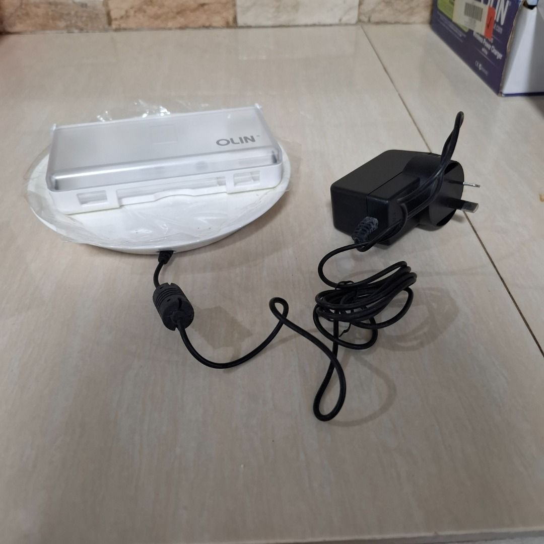 OLIN Nintendo DS Lite Wireless Charger (Category: Nintendo) located in Taysan. Submitted by miguelramos29 (Listing ID 1380430710, Image 1). Description: DS Lite wireless charger 400 only input AC 100-240 volts.