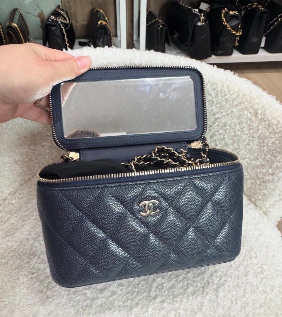 One Day Sale $3600! Full Set Chanel Vanity (Category: Bags & Wallets) located in Singapore. Submitted by theccollectorss (Listing ID 1315215802, Image 2). Description: CHEAPEST Highly Sought After Full Set Chanel Vanity Navy Caviar with Light GHW Comes with - Hologram - Authenticity Card - Dustbag - Box.