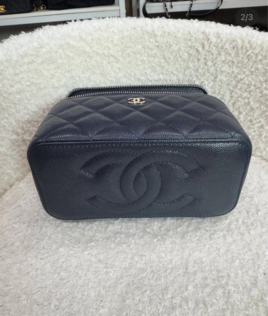 One Day Sale $3600! Full Set Chanel Vanity (Category: Bags & Wallets) located in Singapore. Submitted by theccollectorss (Listing ID 1315215802, Image 3). Description: CHEAPEST Highly Sought After Full Set Chanel Vanity Navy Caviar with Light GHW Comes with - Hologram - Authenticity Card - Dustbag - Box.