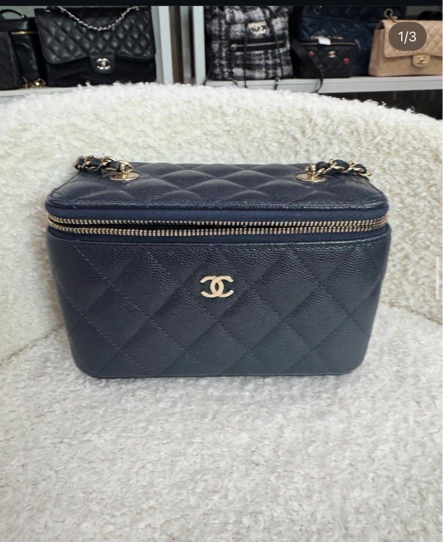 One Day Sale $3600! Full Set Chanel Vanity (Category: Bags & Wallets) located in Singapore. Submitted by theccollectorss (Listing ID 1315215802, Image 1). Description: CHEAPEST Highly Sought After Full Set Chanel Vanity Navy Caviar with Light GHW Comes with - Hologram - Authenticity Card - Dustbag - Box.